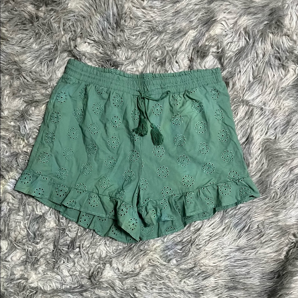 green frilly shorts